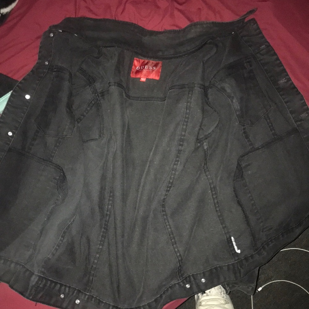Black Guess jean jacket Size large fits medium
